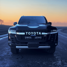Load image into Gallery viewer, Toyota 300 Series Land Ultra Vision Cruiser GR Sport Behind Grille Light Bar Kit
