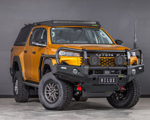Load image into Gallery viewer, Toyota HiLux N90 (26+) Ironman Deluxe Bull Bar &amp; Loom Kit
